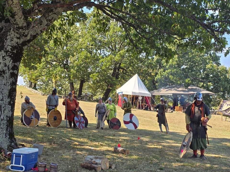 Glomesdal Vikings gathered with shields at the park